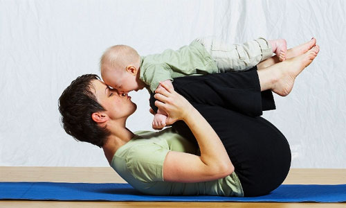 Postnatal yoga with baby