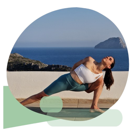 Girl on a yoga mat at a terrace with seaview doing vinyasa flow yoga.